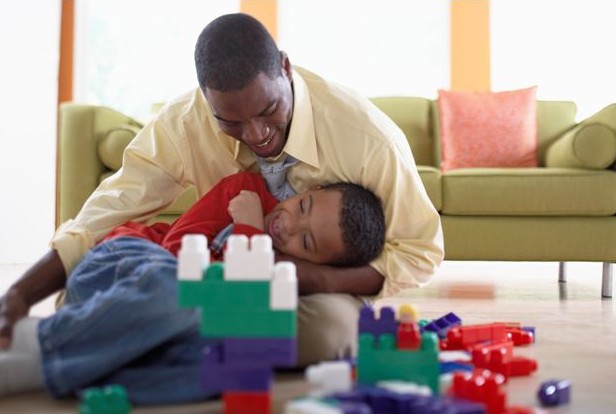 Father and Son Playing